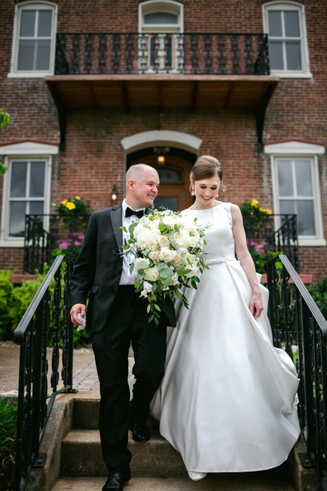 Bride and Groom walking down stairs Washington, MO