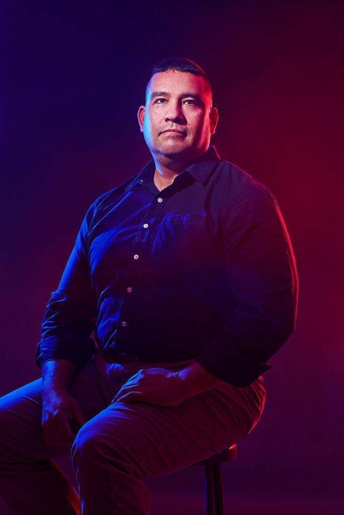 jorge gomez under red and blue lights