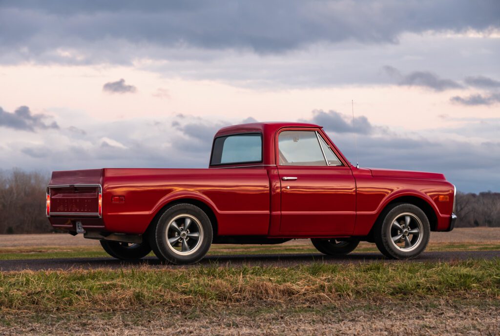 Red Chevy C-10 Shortbed Truck parked on road