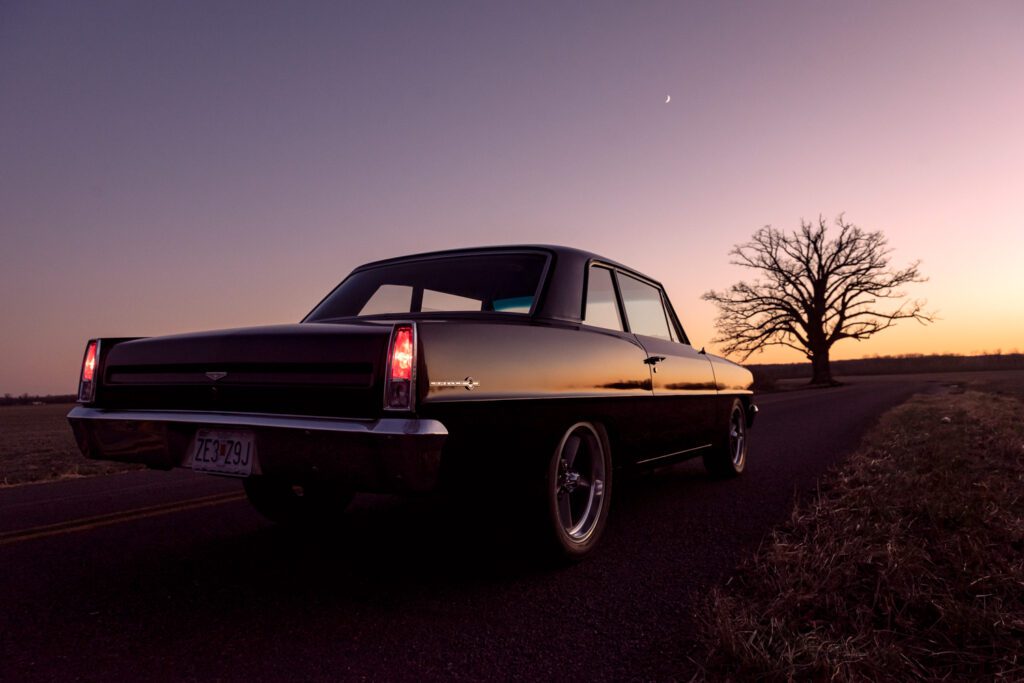 Black 1967 Chevy II at Sunset near Big Tree