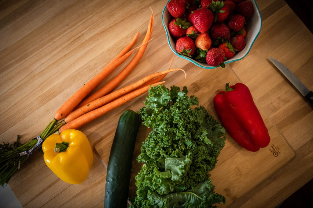 Aerial view of arrangement of fruits and vegetables for commercial ad