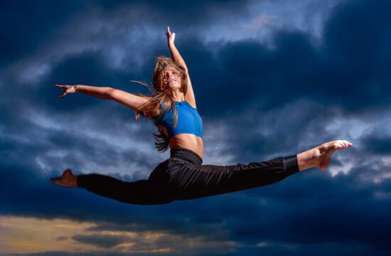 Dancer Jumping with Clouds