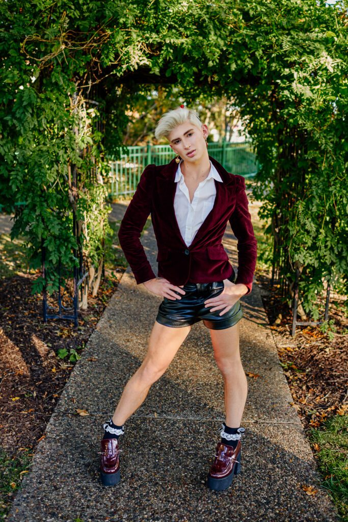 Senior guy poses at Shelter Gardens in Columbia Missouri by Schaefer Photography