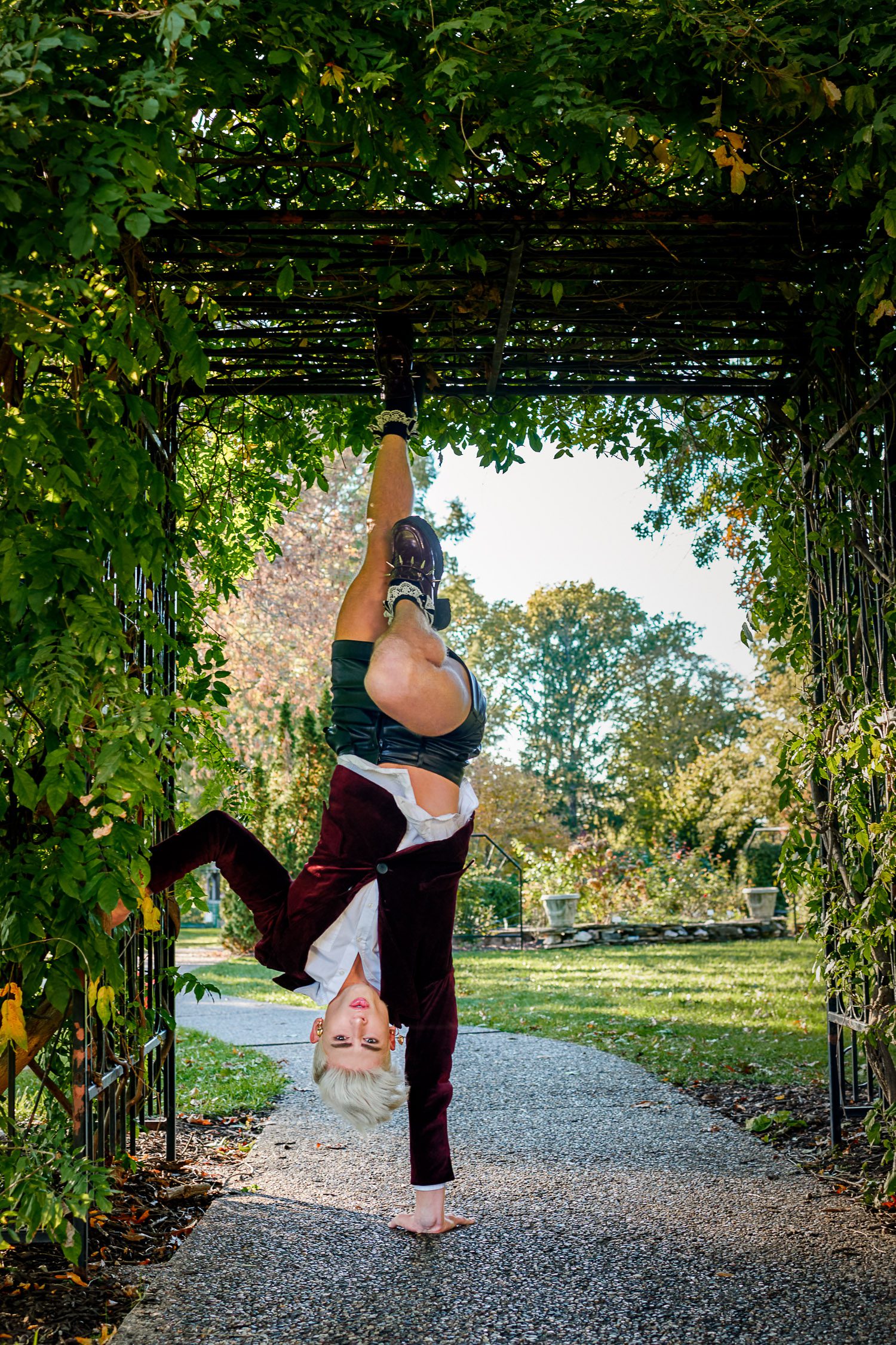 Senior cheerleader holds handstand at shelter gardens columbia missouri