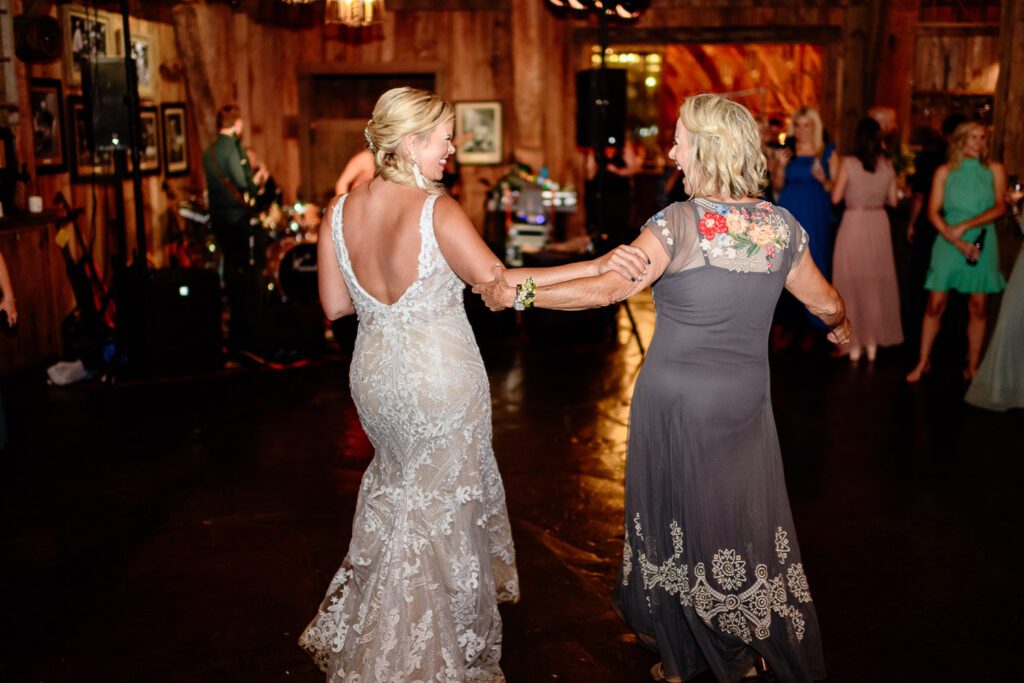 Bride and mother dance Dogwood Canyon