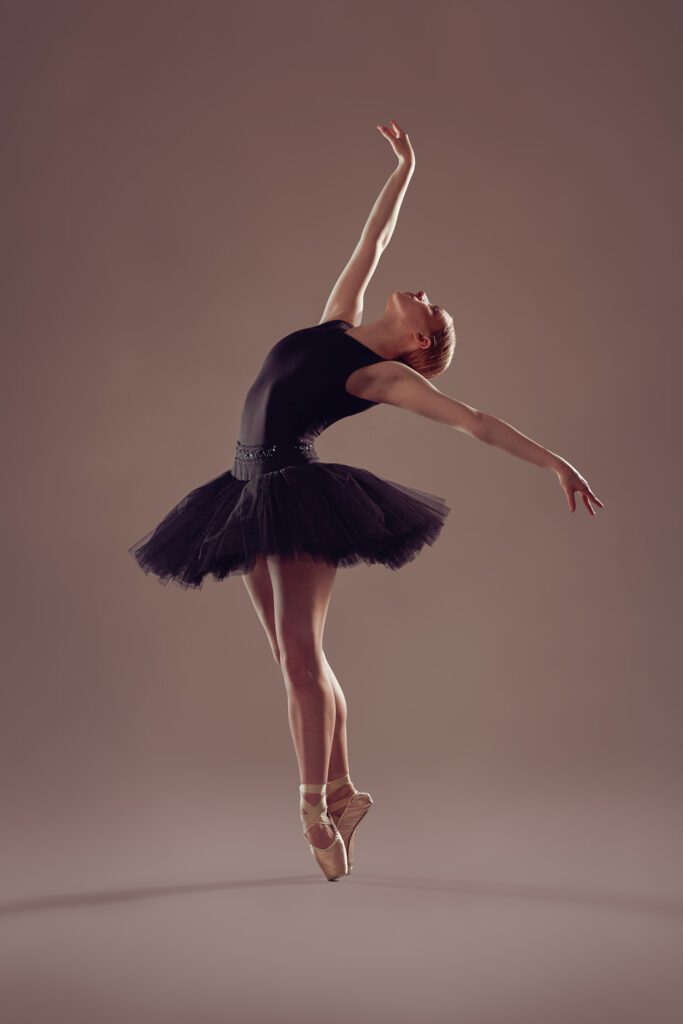 Ballerina in pointe shoes dancing while wearing tutu in Columbia, Missouri.