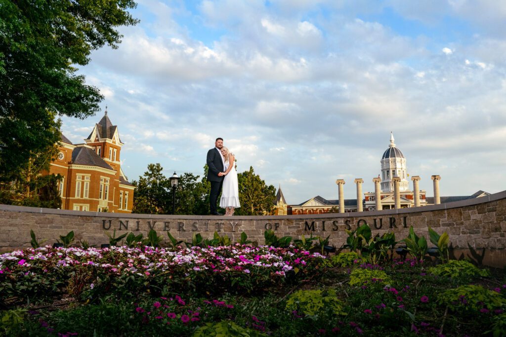 Engagement session at the University of Missouri sign in front of Jesse Hall and the Columns.