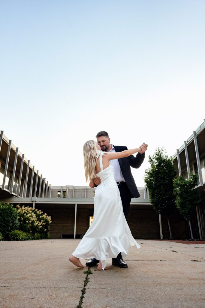 Couple dancing in front of Rhynesburg Theater.