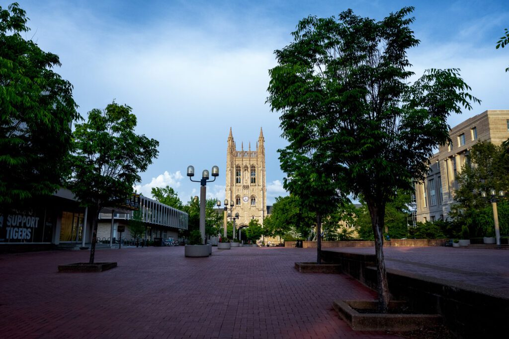 Memorial Union tower seen through Lowry mall with brick walkway. Mizzou Prints.