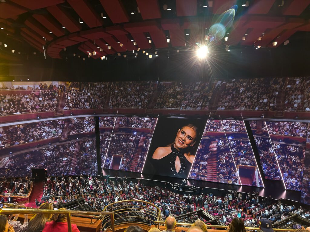 Adele smiles at crowd during her show at the Colosseum at Caesars Palace in Las Vegas by Schaefer Photography.