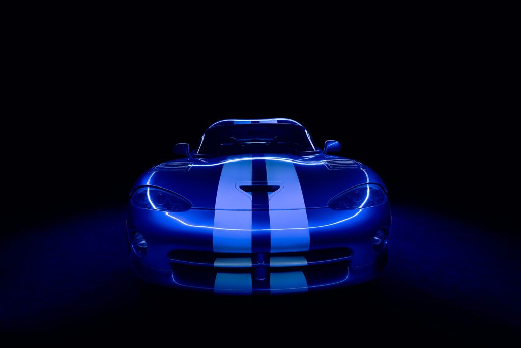 A Blue Dodge Viper Light Painting with black background