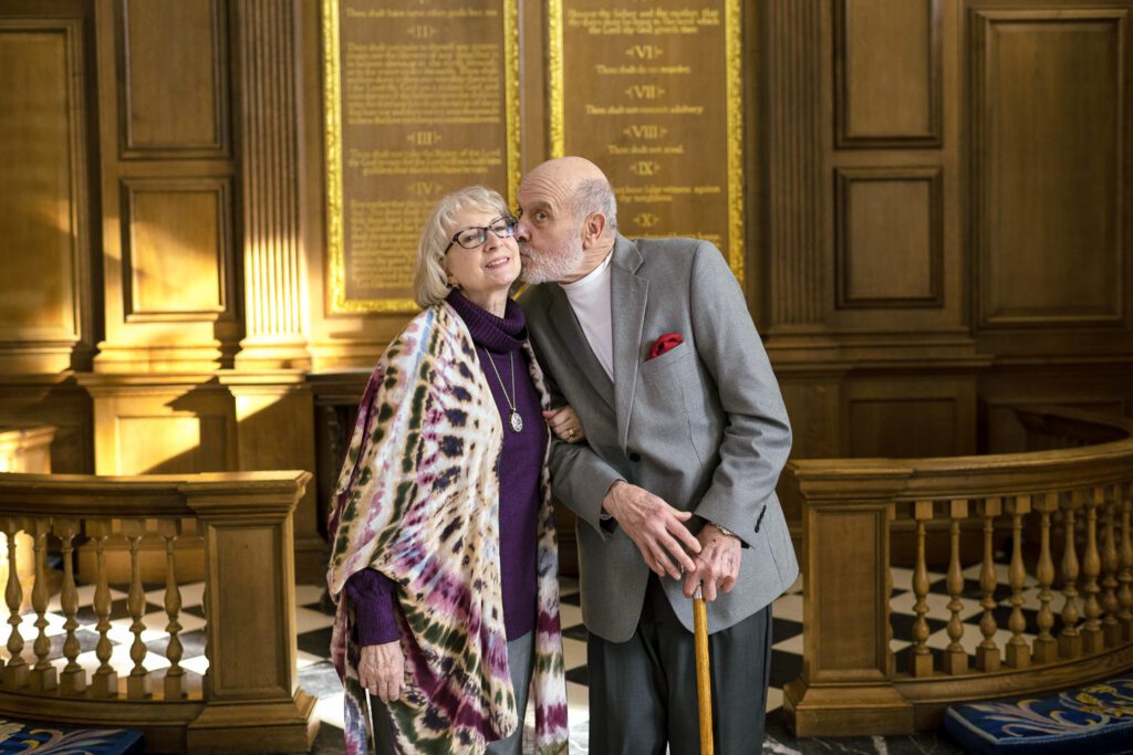 Couple kiss during 50th Anniversary celebration at Sir Christopher Wren's St Mary the Virgin, Aldermanbury at America's National Churchill Museum on the campus of Westminster College in Fulton, Missouri, United States.