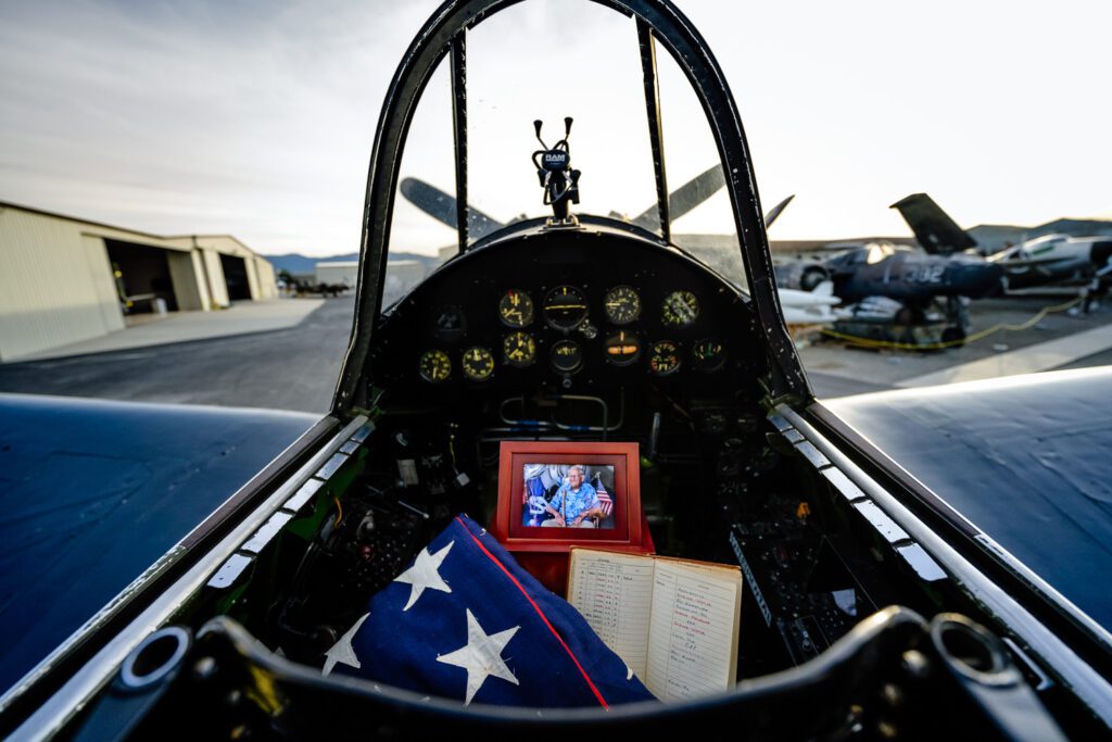 Remains of WWII Veteran sit in the cockpit of the exact Corsair he flew during World War Two during his memorial service at Planes of Fame
