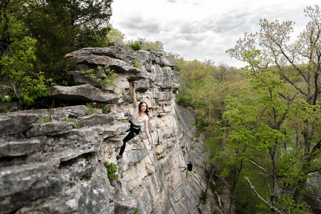 Senior girl rocking climbing in columbia capen park