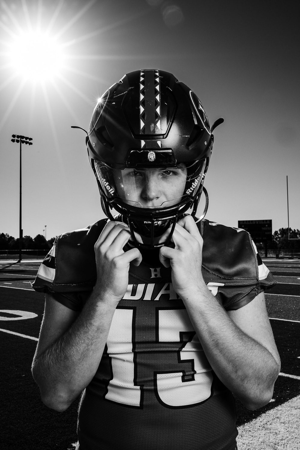 Hallsville senior football player with helmet