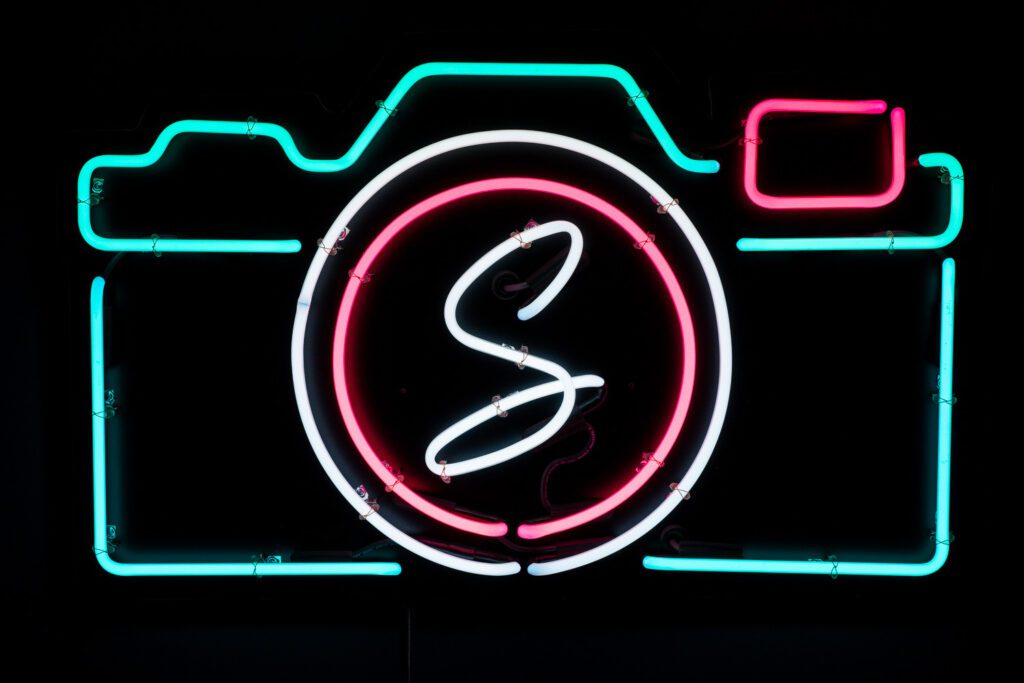 Schaefer Photography Turquoise, Pink and White neon camera sign