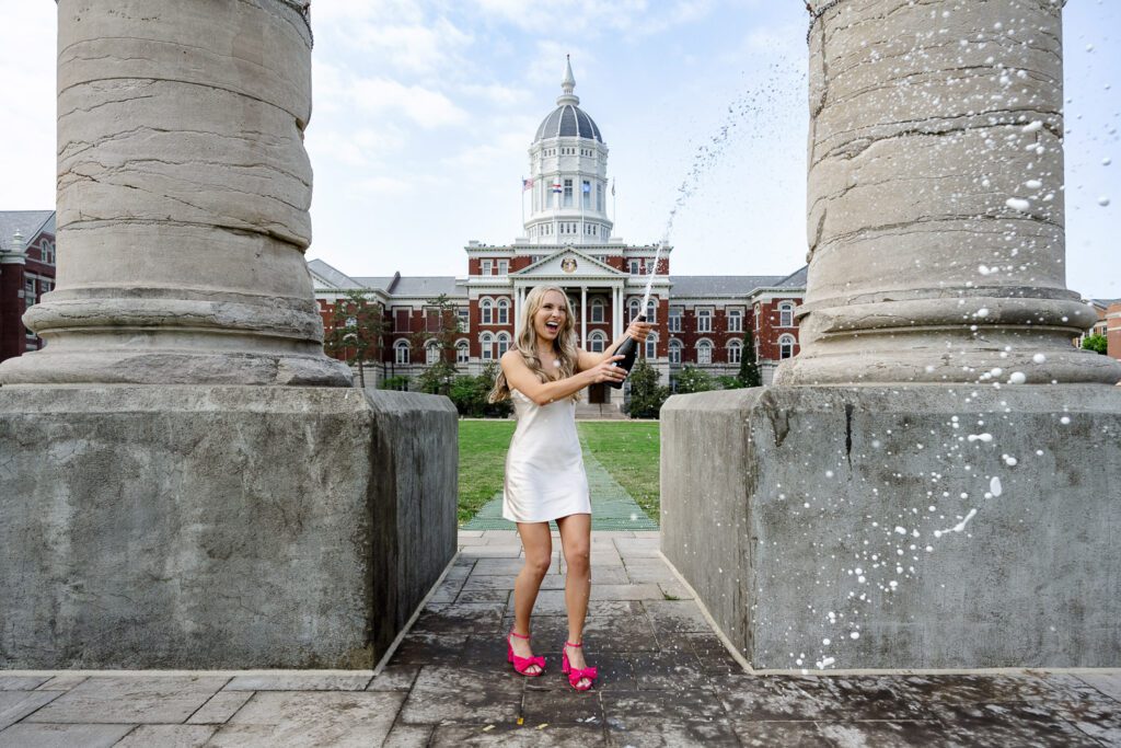 mizzou senior girl spraying champagne 