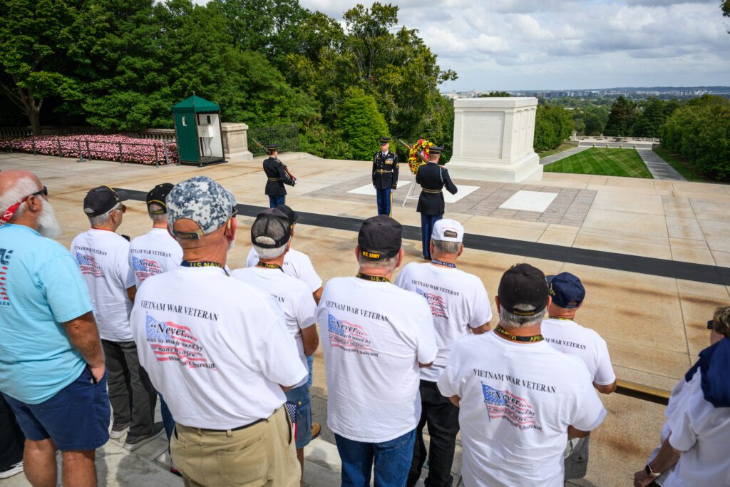 veterans at the tomb of the unknown soldiers on honor flight